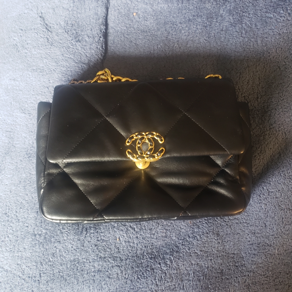 CHANEL Black Crossbody Bag with Gold Accents